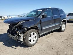 Jeep Grand Cherokee salvage cars for sale: 2012 Jeep Grand Cherokee Laredo