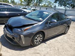 Salvage cars for sale at Riverview, FL auction: 2021 Toyota Prius LE