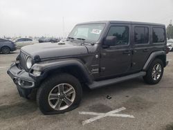 Salvage SUVs for sale at auction: 2019 Jeep Wrangler Unlimited Sahara