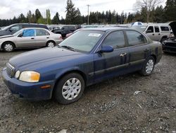 Salvage cars for sale from Copart Graham, WA: 2003 KIA Optima LX