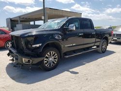 Salvage cars for sale from Copart West Palm Beach, FL: 2017 Nissan Titan XD SL