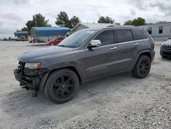 Jeep Grand Cherokee Overland salvage cars for sale: 2014 Jeep Grand Cherokee Overland