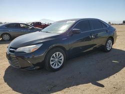 Salvage cars for sale at Bakersfield, CA auction: 2016 Toyota Camry Hybrid
