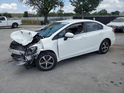 Salvage cars for sale from Copart Orlando, FL: 2015 Honda Civic SE