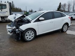 Salvage cars for sale from Copart Bowmanville, ON: 2013 Ford Focus SE