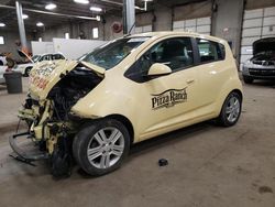 Salvage cars for sale from Copart Blaine, MN: 2013 Chevrolet Spark 1LT