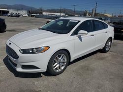Salvage cars for sale from Copart Sun Valley, CA: 2013 Ford Fusion SE