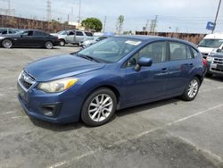 Salvage cars for sale from Copart Wilmington, CA: 2012 Subaru Impreza Premium
