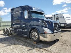 Salvage trucks for sale at Pekin, IL auction: 2012 Volvo VN VNL