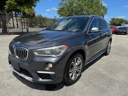 Salvage cars for sale at Opa Locka, FL auction: 2016 BMW X1 XDRIVE28I