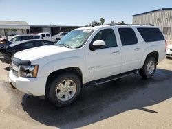 Salvage cars for sale from Copart Fresno, CA: 2011 Chevrolet Suburban K1500 LT