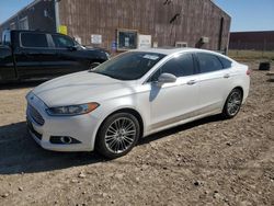 Salvage cars for sale at Rapid City, SD auction: 2013 Ford Fusion SE