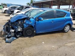 Salvage cars for sale from Copart Riverview, FL: 2013 Toyota Prius C