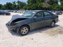 Salvage cars for sale at Ocala, FL auction: 2004 Toyota Camry LE