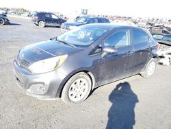 Salvage cars for sale from Copart Montreal Est, QC: 2013 KIA Rio LX