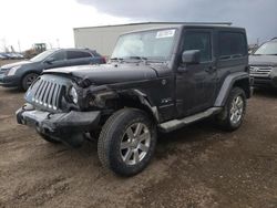 Salvage cars for sale from Copart Rocky View County, AB: 2017 Jeep Wrangler Sahara