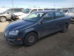 Salvage cars for sale at Nisku, AB auction: 2009 Volkswagen Jetta S