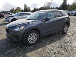 Salvage cars for sale from Copart Graham, WA: 2013 Mazda CX-5 Touring