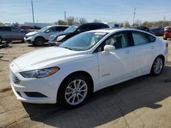 Salvage cars for sale at Woodhaven, MI auction: 2017 Ford Fusion SE Hybrid