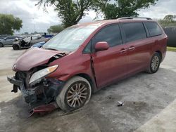 Salvage cars for sale from Copart Orlando, FL: 2017 Toyota Sienna XLE