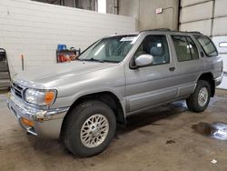 Salvage cars for sale from Copart Blaine, MN: 1998 Nissan Pathfinder LE