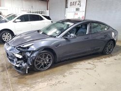 Salvage cars for sale at auction: 2022 Tesla Model 3