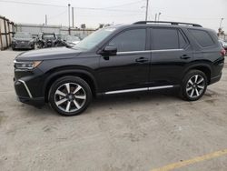 Flood-damaged cars for sale at auction: 2023 Honda Pilot Elite