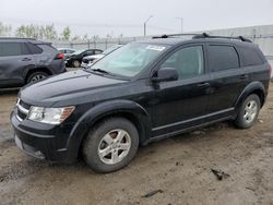 Salvage cars for sale from Copart Nisku, AB: 2009 Dodge Journey SE
