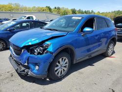 Salvage cars for sale from Copart Exeter, RI: 2014 Mazda CX-5 Touring