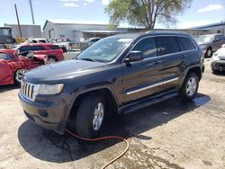 Salvage SUVs for sale at auction: 2011 Jeep Grand Cherokee Laredo