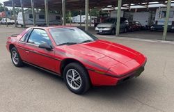 Salvage cars for sale at Woodburn, OR auction: 1985 Pontiac Fiero SE