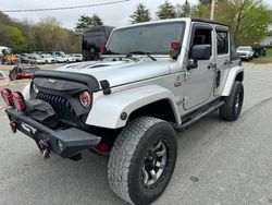 Salvage cars for sale at North Billerica, MA auction: 2010 Jeep Wrangler Unlimited Sahara