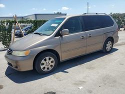 Salvage cars for sale from Copart Orlando, FL: 2004 Honda Odyssey EX