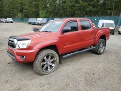 Salvage cars for sale from Copart Graham, WA: 2013 Toyota Tacoma Double Cab