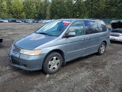 Salvage cars for sale from Copart Graham, WA: 2001 Honda Odyssey EX