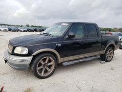 Salvage trucks for sale at San Antonio, TX auction: 2001 Ford F150 Supercrew