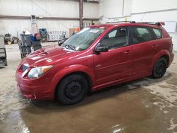 Salvage cars for sale from Copart Nisku, AB: 2004 Pontiac Vibe