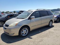Salvage cars for sale at auction: 2005 Toyota Sienna XLE
