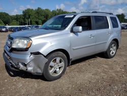 Salvage cars for sale at auction: 2011 Honda Pilot EXL