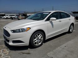 Salvage cars for sale from Copart Sun Valley, CA: 2014 Ford Fusion SE