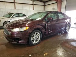 Salvage cars for sale at Lansing, MI auction: 2018 Ford Fusion SE Hybrid