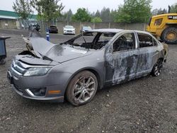 Salvage cars for sale from Copart Graham, WA: 2011 Ford Fusion SE