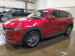 Salvage vehicles for parts for sale at auction: 2021 Mazda CX-5 Grand Touring