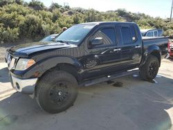 Salvage cars for sale at Reno, NV auction: 2009 Nissan Frontier Crew Cab SE