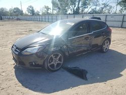 Salvage cars for sale from Copart Riverview, FL: 2012 Ford Focus Titanium