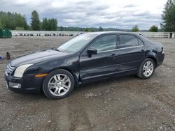 Salvage cars for sale from Copart Arlington, WA: 2009 Ford Fusion SEL