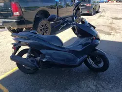 Salvage motorcycles for sale at Rogersville, MO auction: 2013 Honda PCX 150