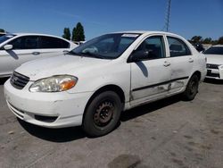 Salvage cars for sale from Copart Hayward, CA: 2003 Toyota Corolla CE