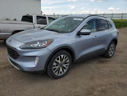 Salvage cars for sale at Portland, MI auction: 2022 Ford Escape Titanium