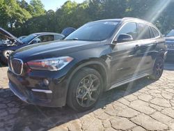 BMW x1 salvage cars for sale: 2018 BMW X1 XDRIVE28I
